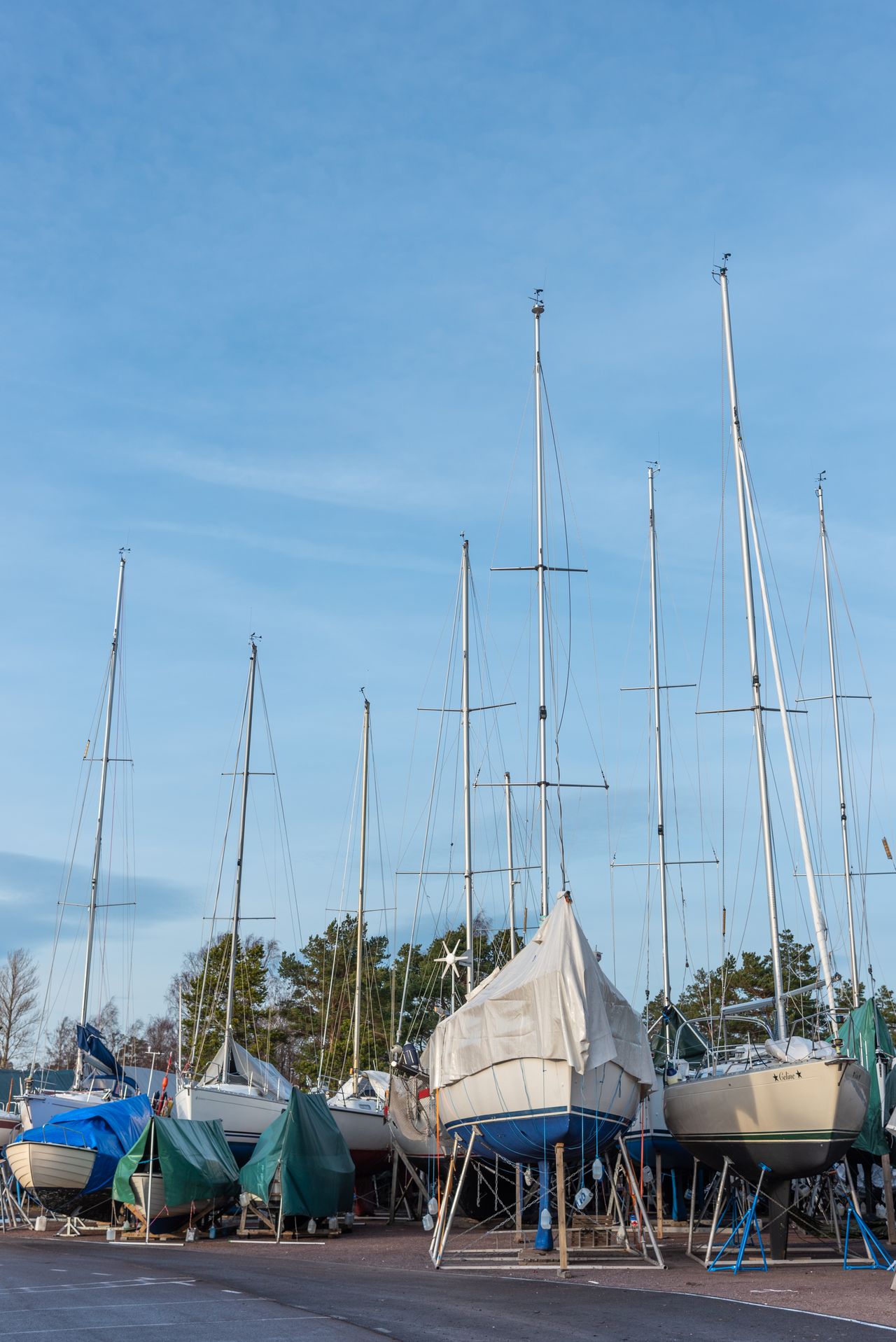 Boats hauled out on cradles in a busy boatyard